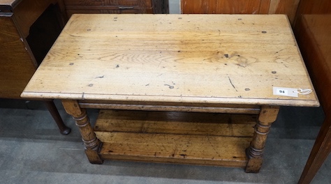 An 18th century style pale oak two tier coffee table, length 91cm, depth 50cm, height 45cm